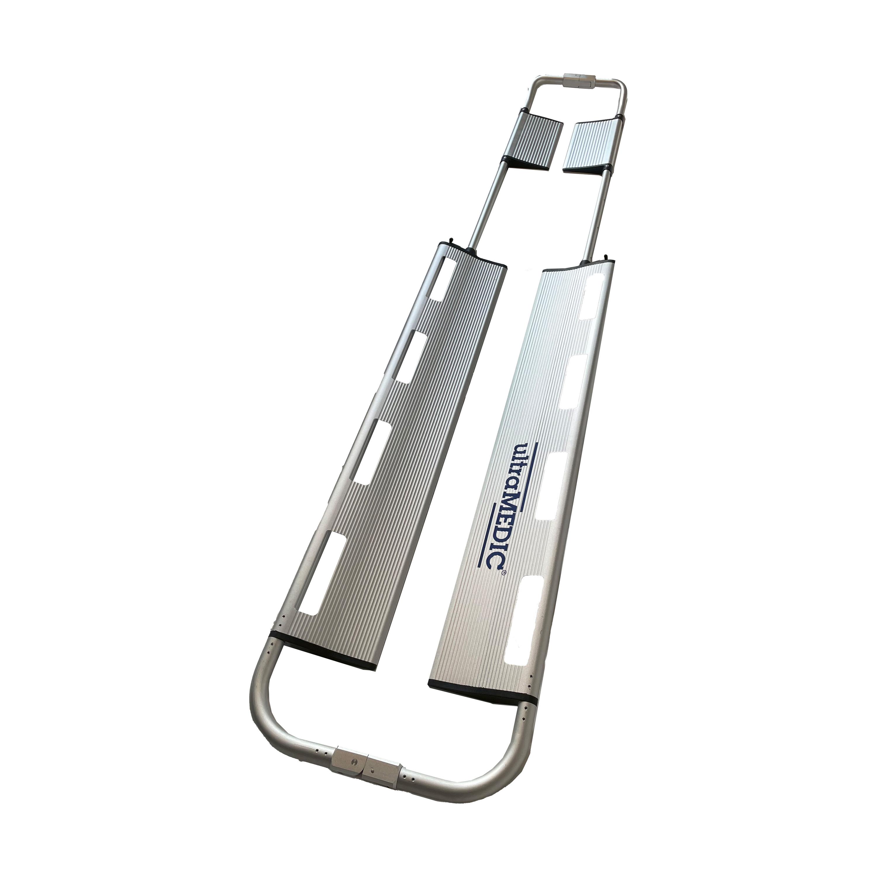 Schaufeltrage gemäß EN 1865 aus leichtem Aluminium, seitlich liegend, mit klappbarem Design, stabilem Rahmen und gepolsterten Griffen.