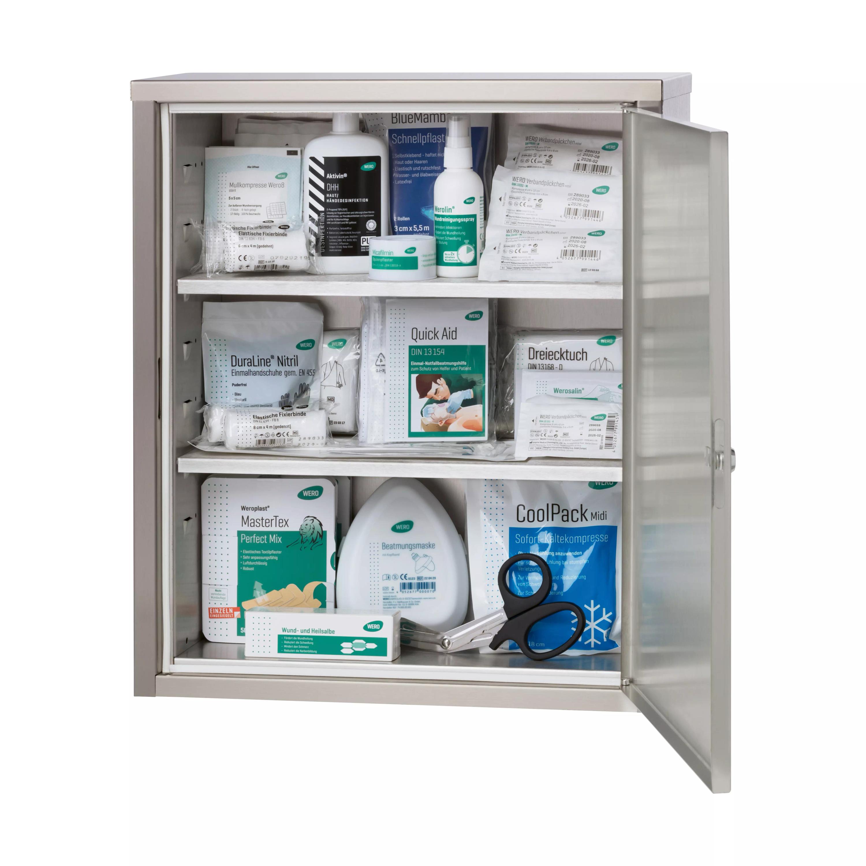 WERO Verbandschrank Maxi V2A 400 mit zwei verstellbaren Zwischenböden, gefüllt mit sortierten Verbandsmaterialien und Medikamenten in stabilem Metallgehäuse.