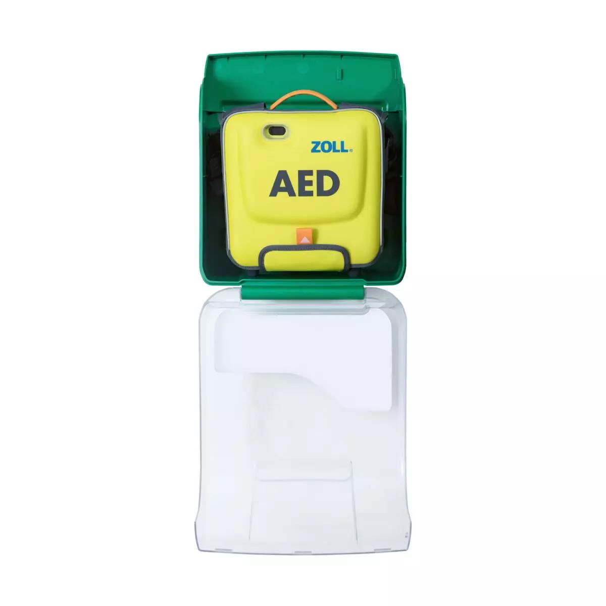 AED-Wandschrank AIVIA IN 100 mit offenem, transparentem Gehäuse aus robustem ABS-Kunststoff und ergonomischem Griff, ein gelber Defibrillator ist sichtbar.