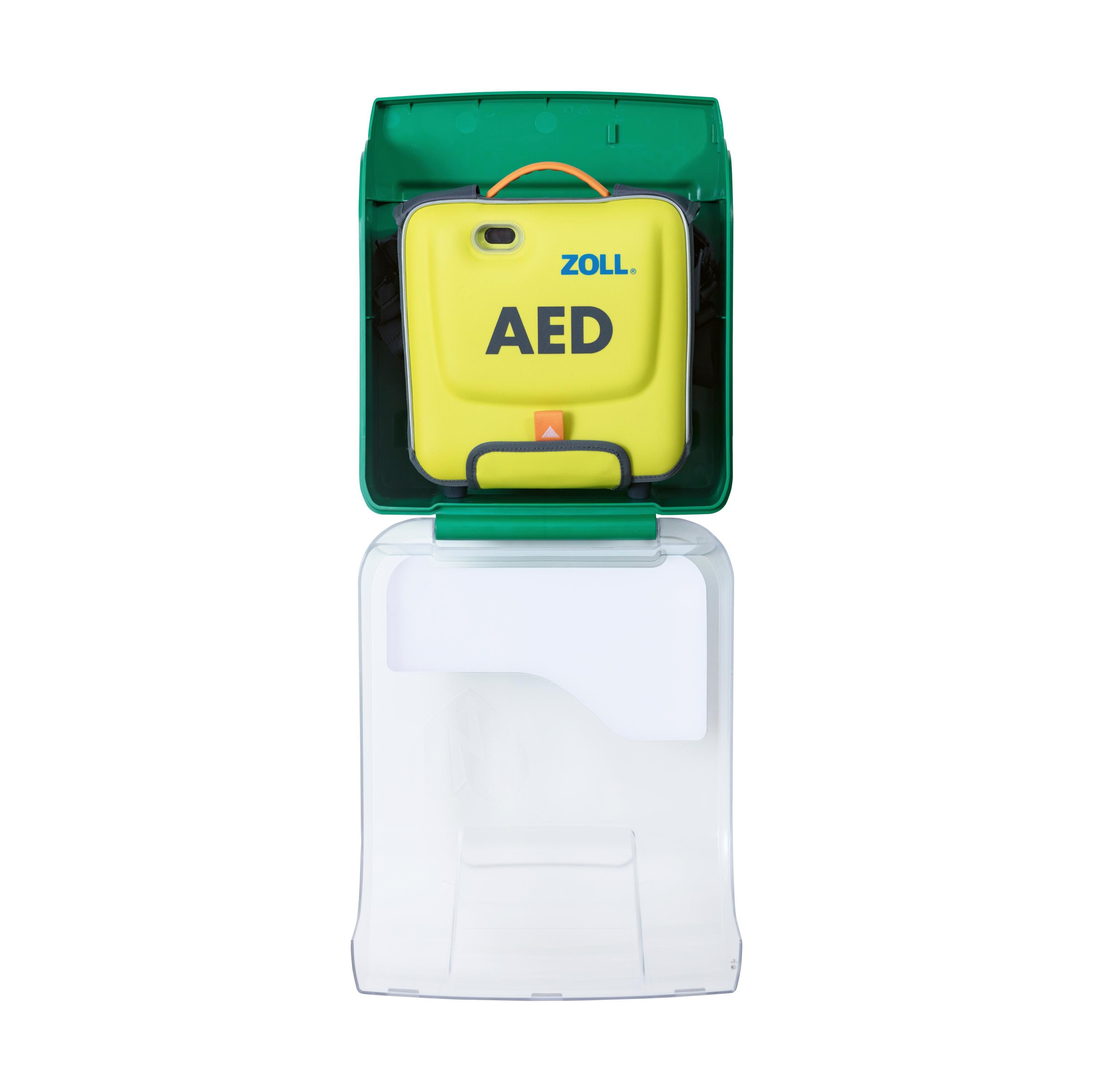 AED-Wandschrank AIVIA IN 100 mit offenem, transparentem Gehäuse aus robustem ABS-Kunststoff und ergonomischem Griff, ein gelber Defibrillator ist sichtbar.