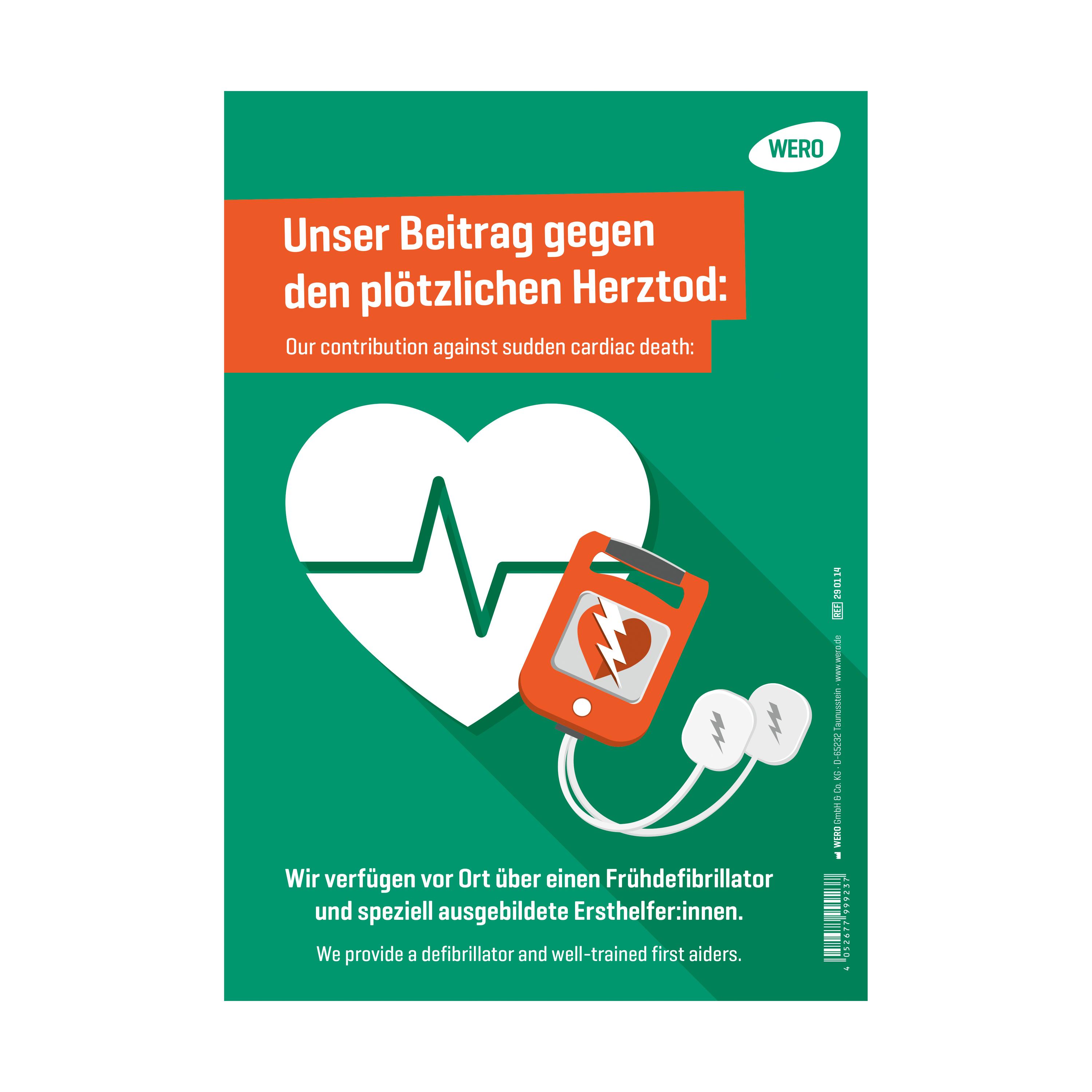 Grünes Hinweisschild: Defibrillator vorhanden mit rotem Herzsymbol, Defibrillator-Illustration und deutsch-englischem Sicherheitshinweis.