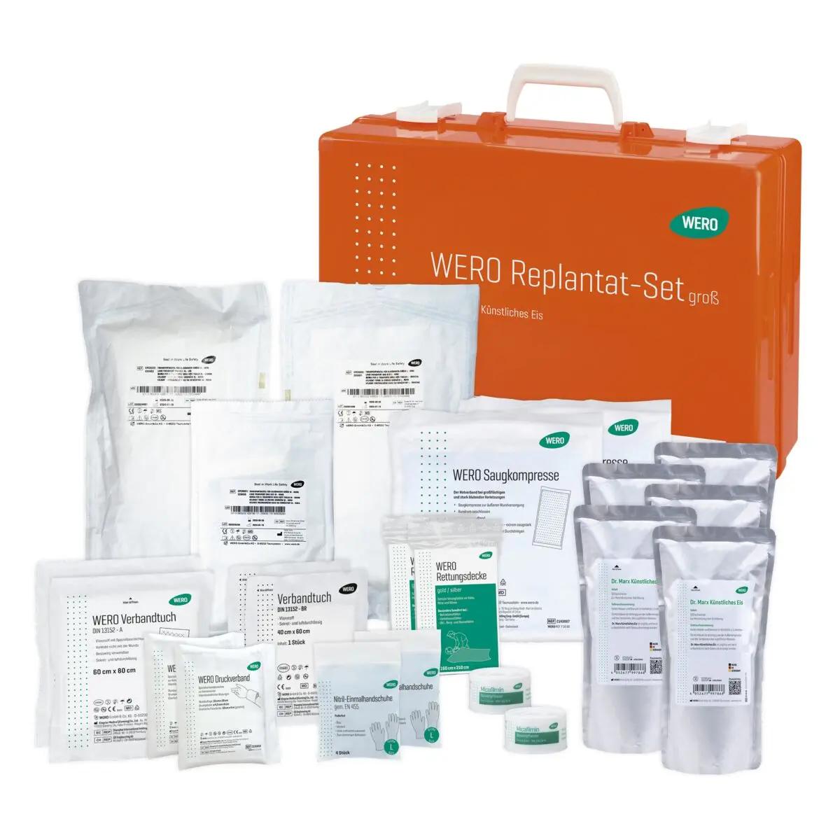 Orangefarbenes WERO Replantat-Set grob mit sterilem Verbandsmaterial, Gazen, Salben und weiterem medizinischem Zubehör.