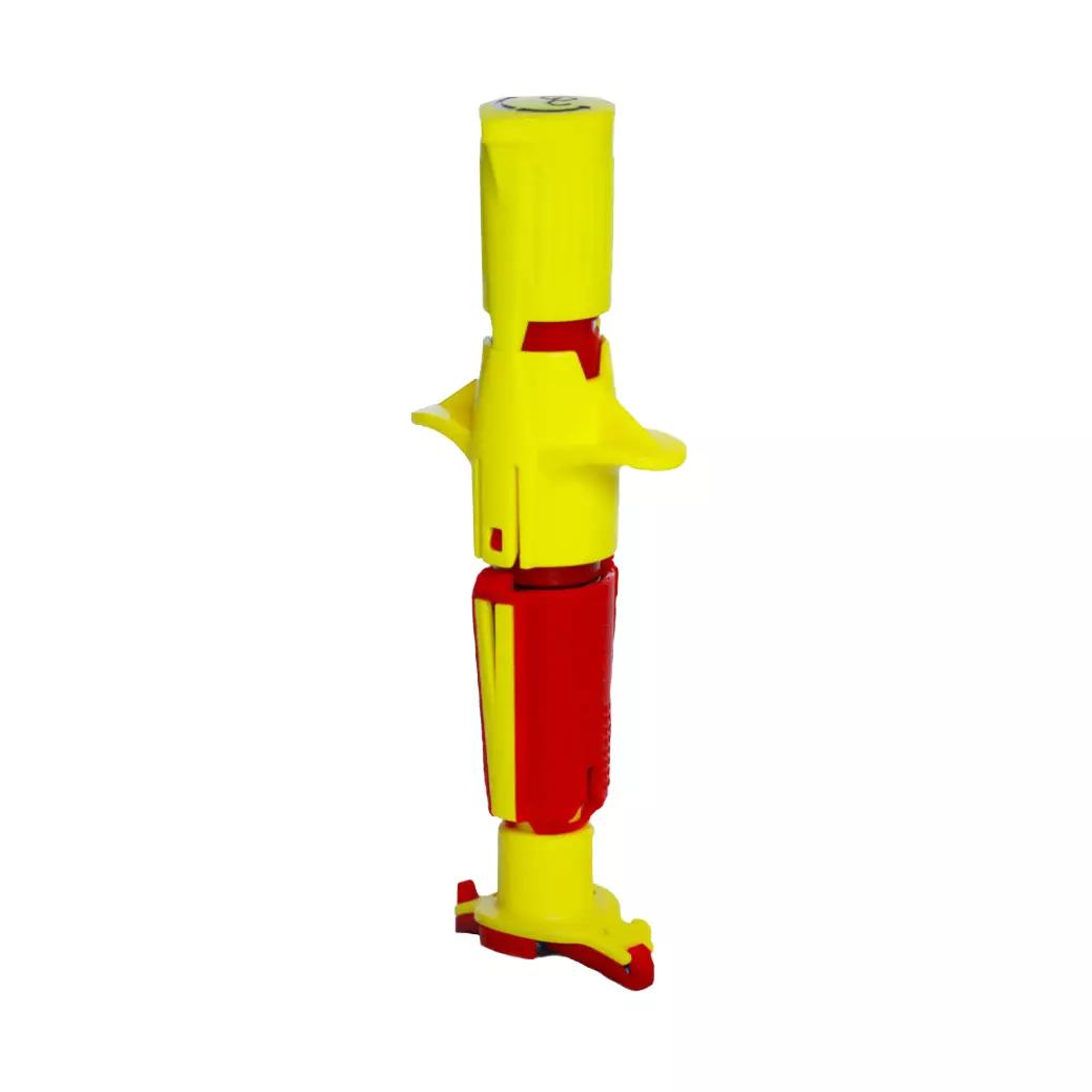 Der NIO™ Trainer - Kinder zeigt ein gelb-rotes Übungsgerät mit zwei seitlichen Griffen und einer spitzen Endung zur IO-Zugangssimulation.